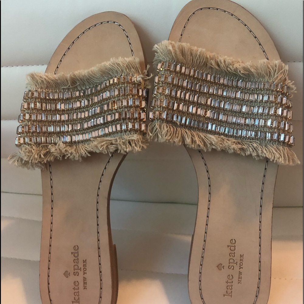 Slip on sandals with a big pop of bling